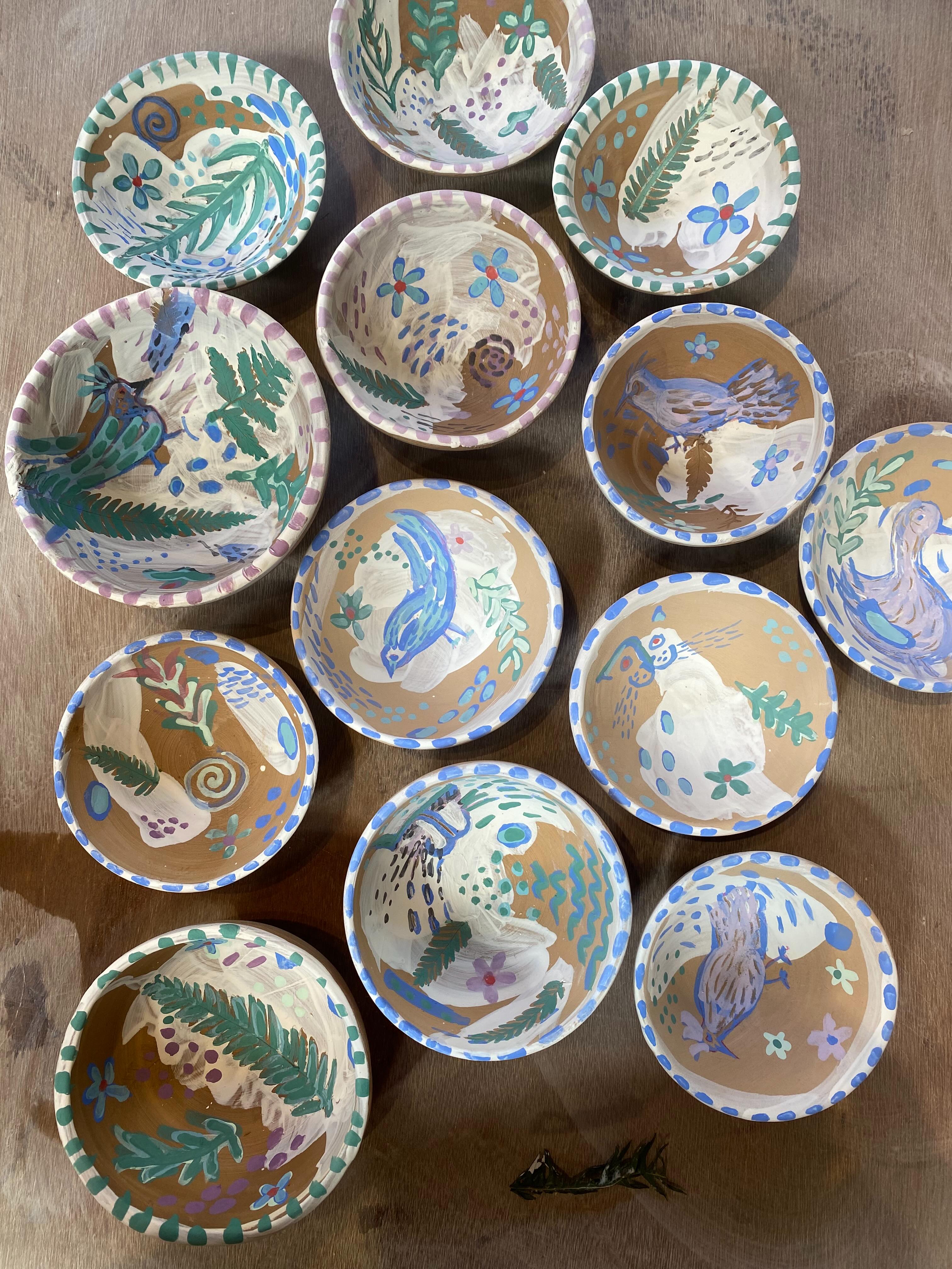 Recent hand-painted bird and botanical ceramic bowls by Leaf Ceramics