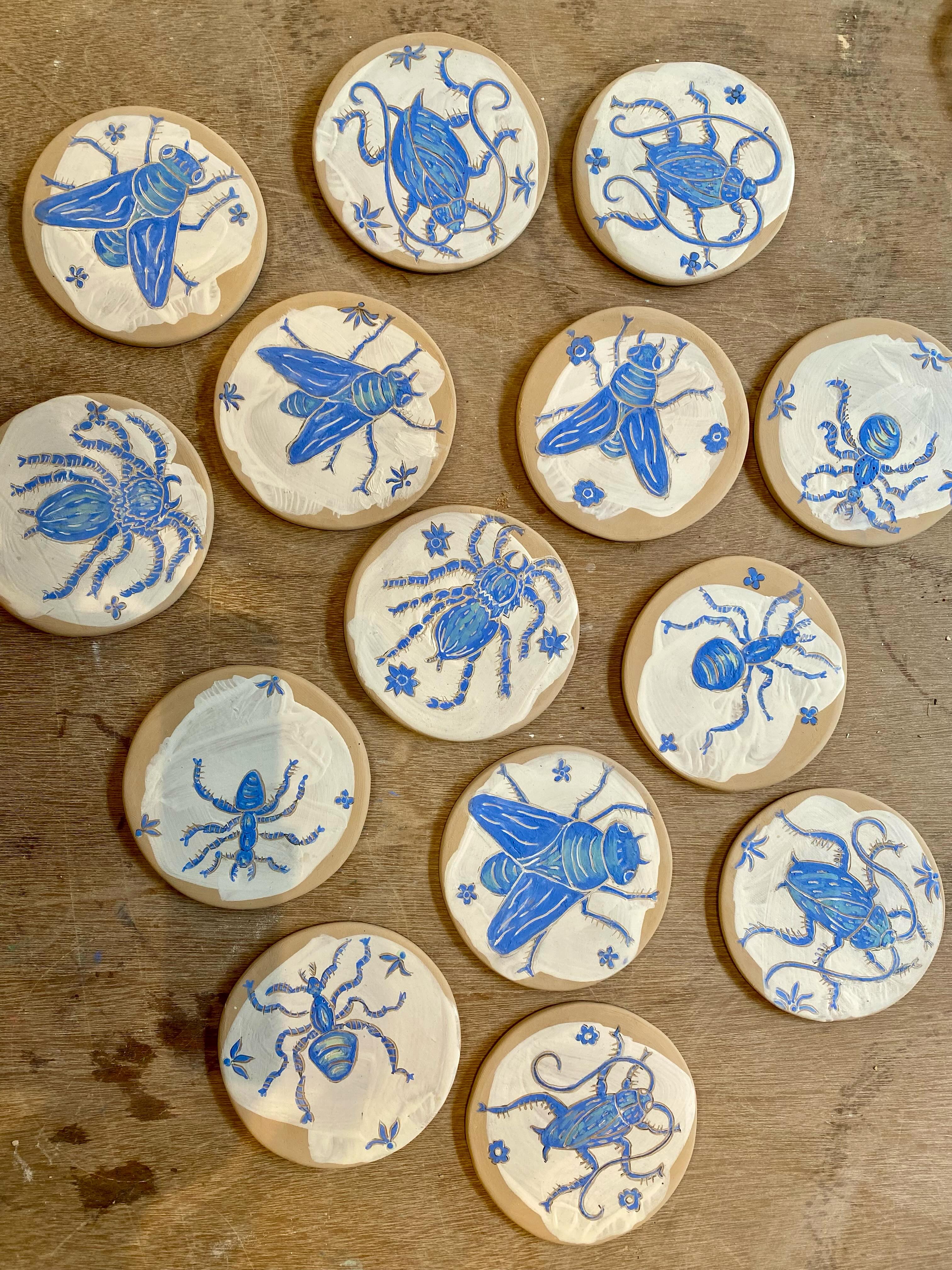 Recent blue insect ceramic plates by Leaf Ceramics